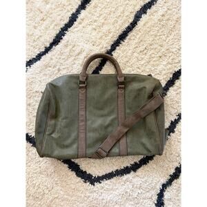 Jackson Vinyl Duffle Green Shoulder strap Outer pocket Weekender bag